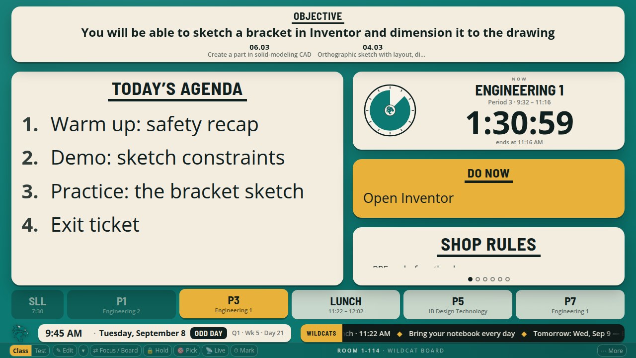 The board face with the objective as a full-width tile across the top, above the agenda, showing the phrased objective and two standards codes with their benchmark names.
